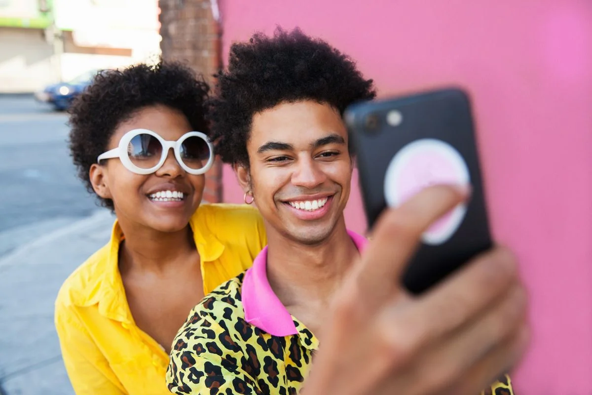 2 people taking a picture together