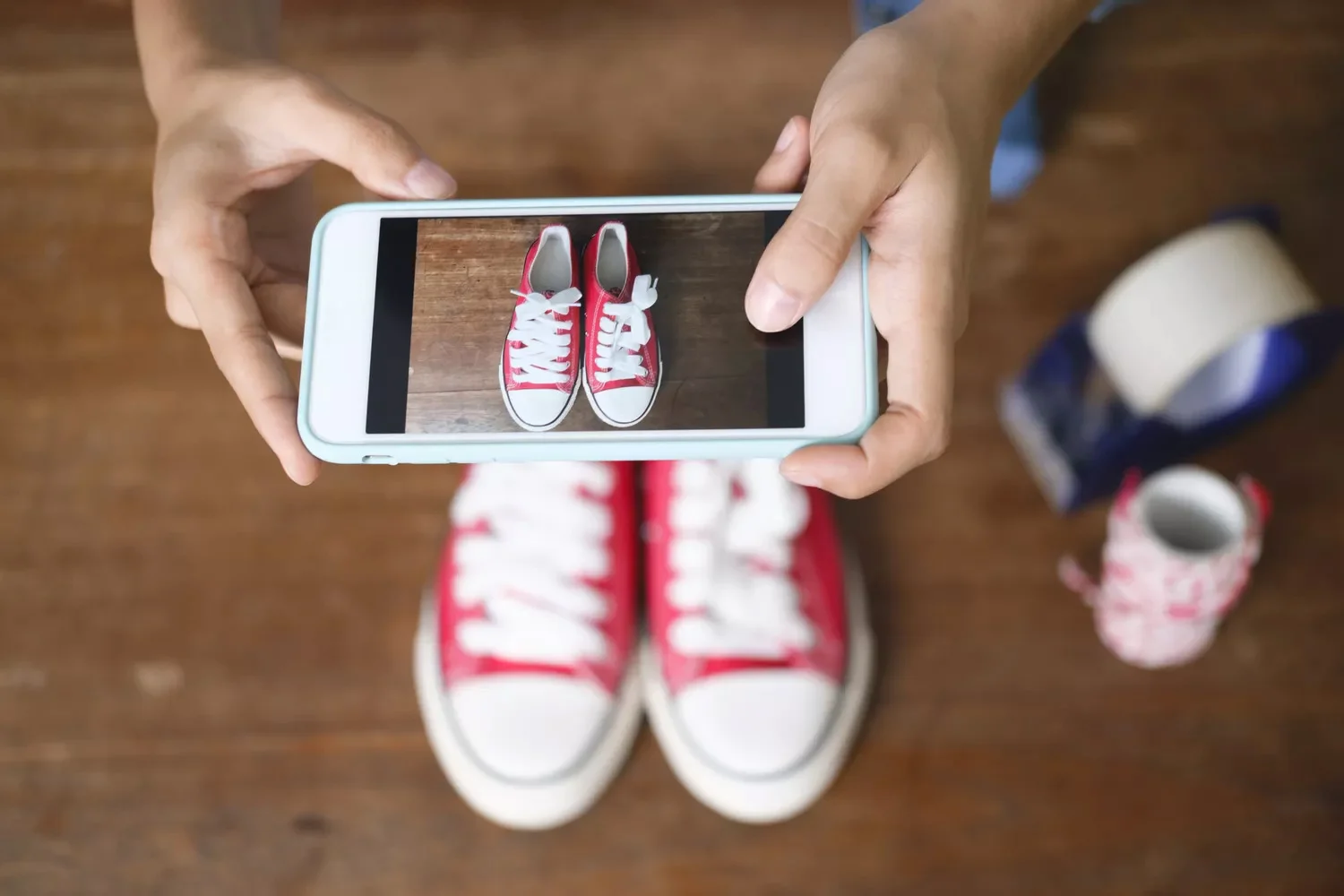 taking a picture of Red shoes