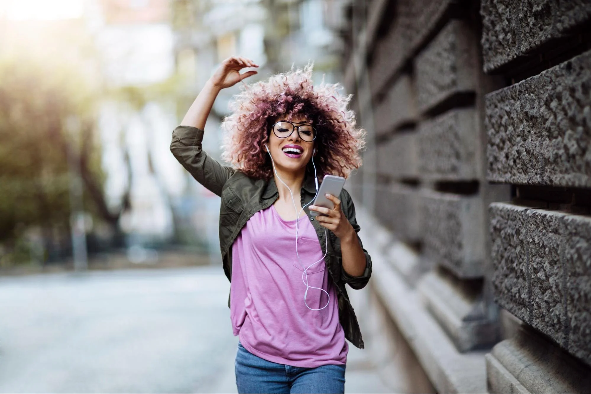 woman listening to music and singing