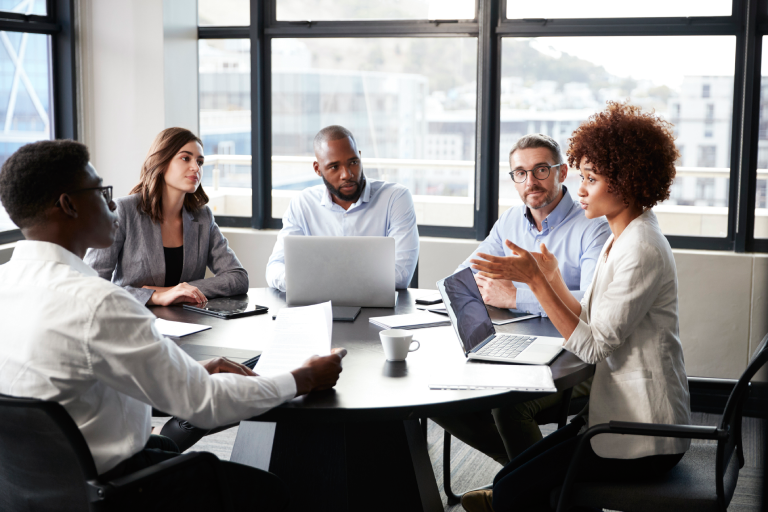 Five people in a business meeting