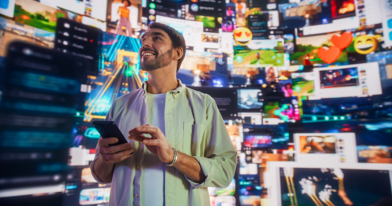 Man surrounded by countless amount of screens